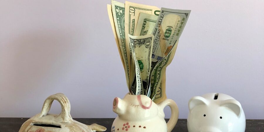 white ceramic teapot beside white ceramic teapot